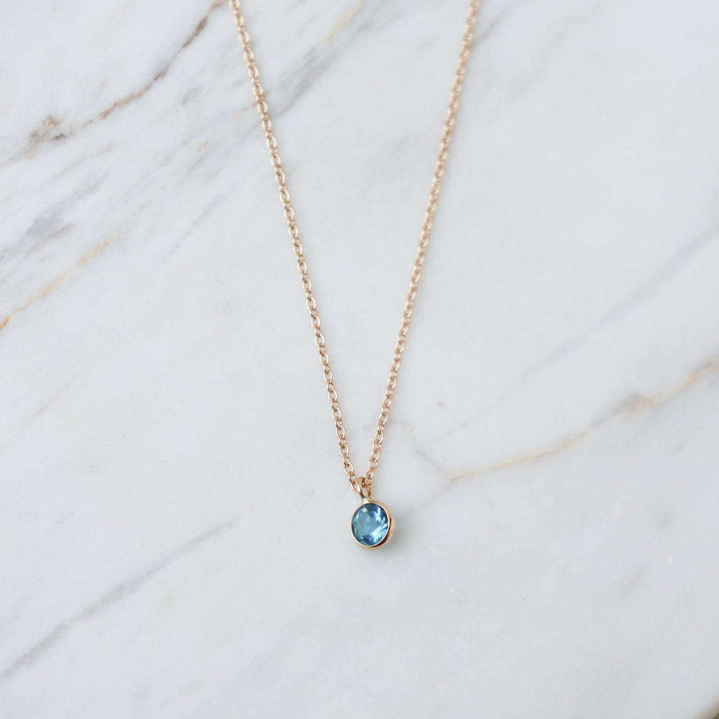 NKL-14K Yellow Gold & Dark Blue Topaz Solitaire Necklace