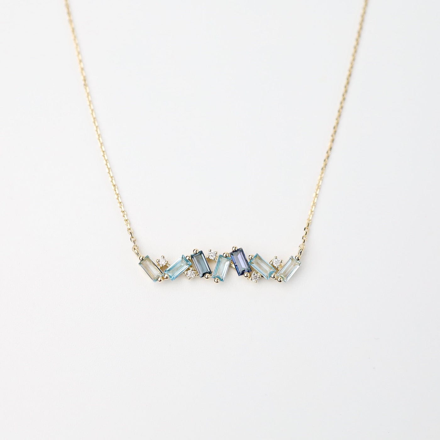 NKL-14K Yellow Gold Frenesia Mixed Blue Topaz Bar Necklace