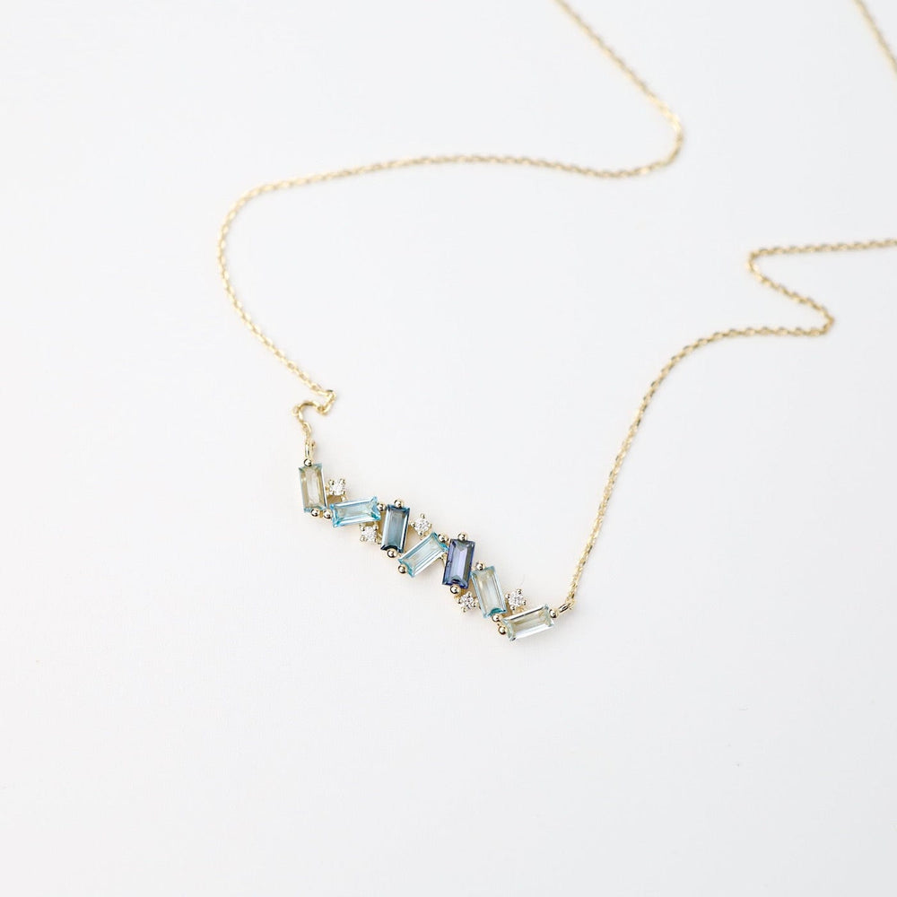 
                  
                    NKL-14K Yellow Gold Frenesia Mixed Blue Topaz Bar Necklace
                  
                