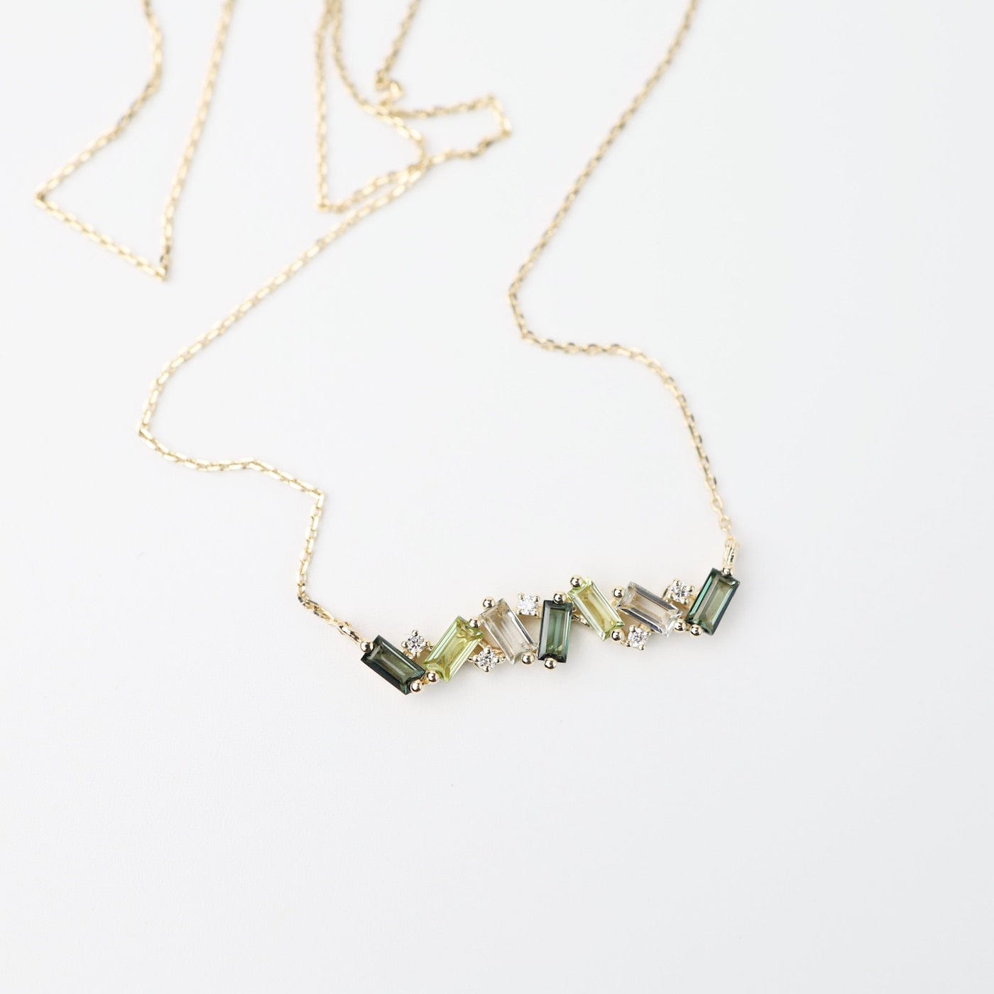 NKL-14K Yellow Gold Frenesia Mixed Green Topaz Bar Necklace