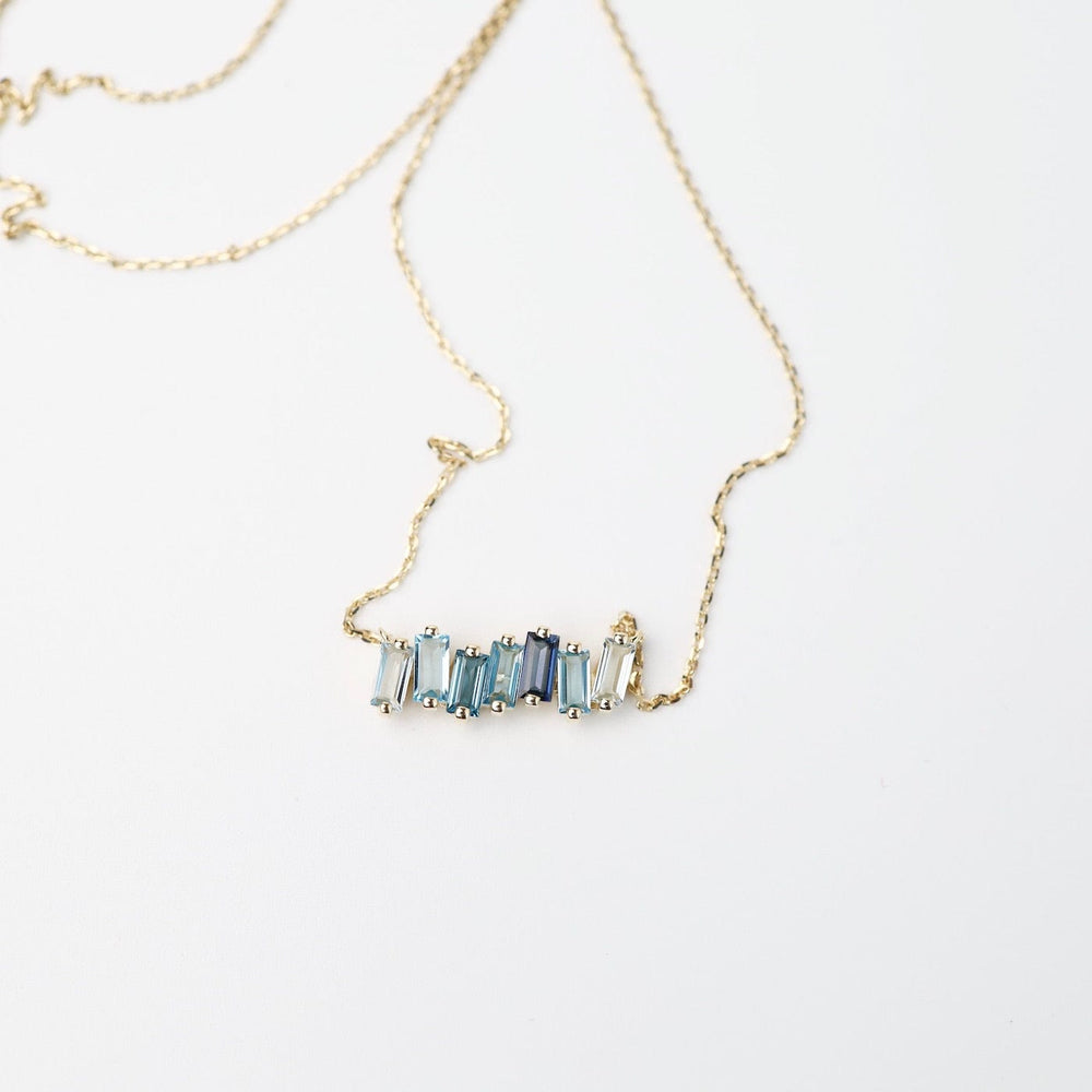 
                      
                        NKL-14K Yellow Gold Mixed Blue Baguette Bar Necklace
                      
                    