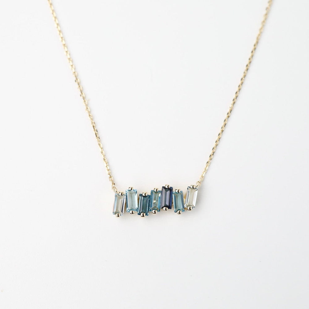 
                      
                        NKL-14K Yellow Gold Mixed Blue Baguette Bar Necklace
                      
                    