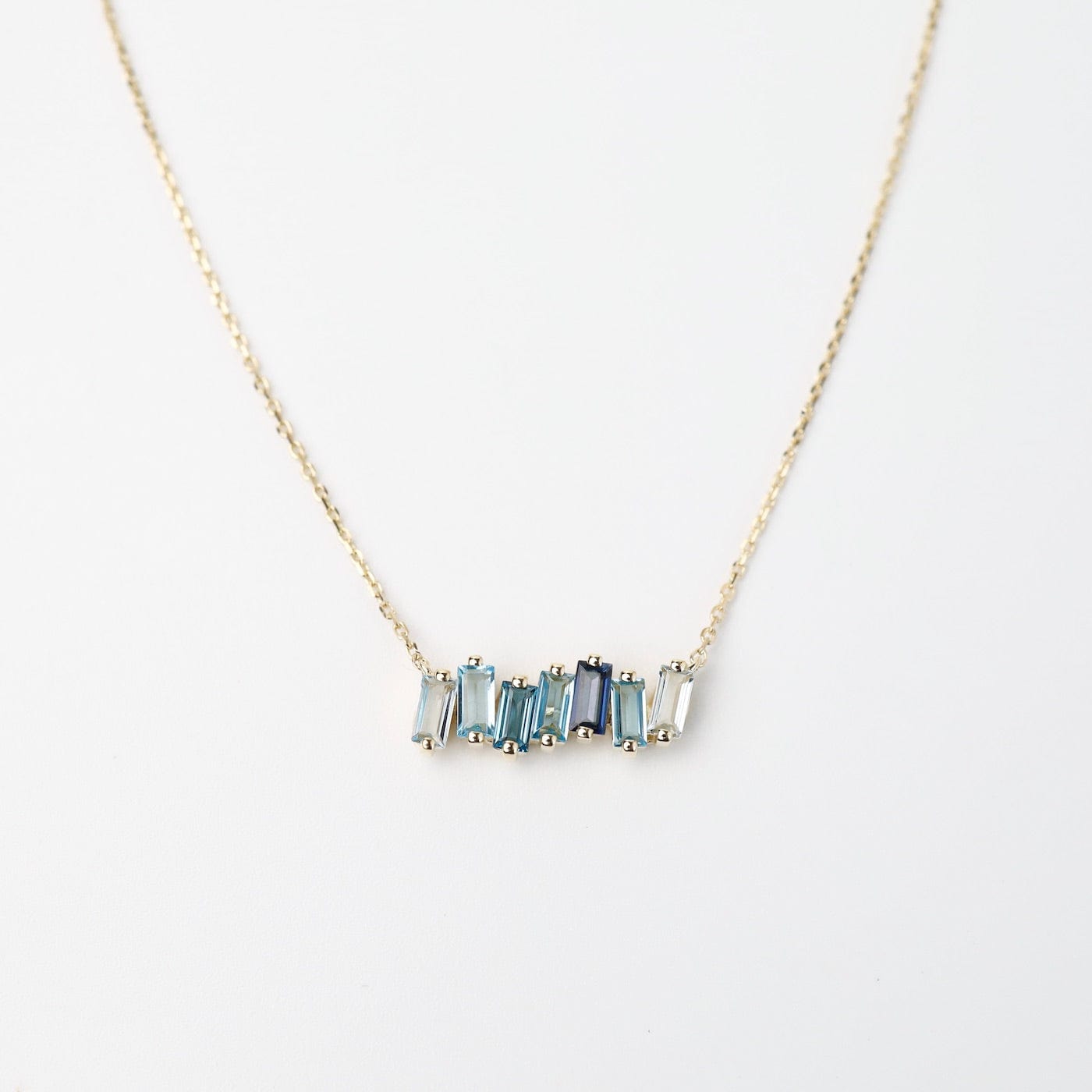 NKL-14K Yellow Gold Mixed Blue Baguette Bar Necklace