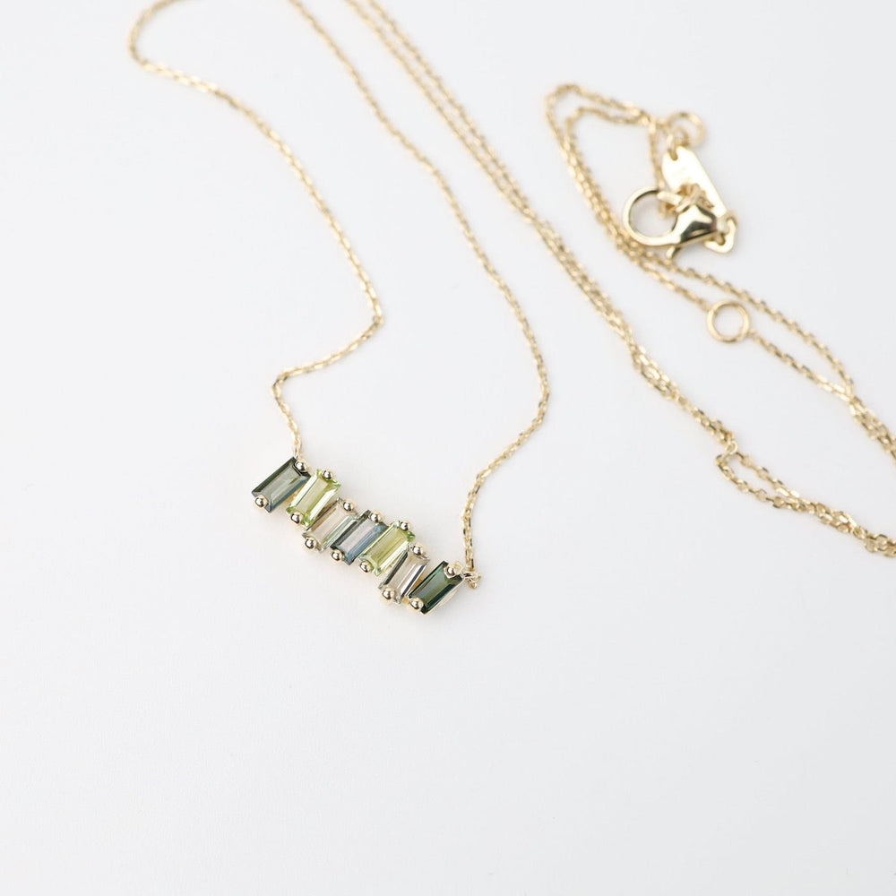 
                      
                        NKL-14K Yellow Gold Mixed Green Baguette Bar Necklace
                      
                    