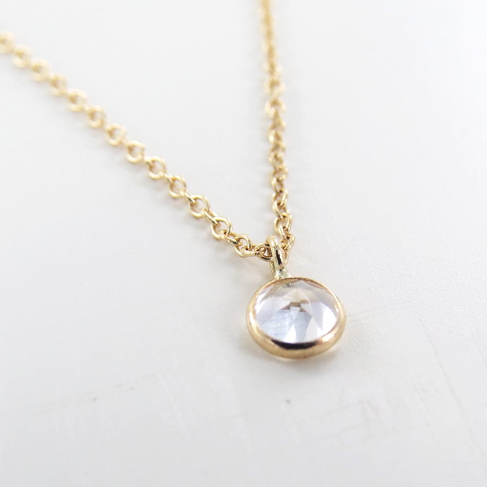 
                      
                        NKL-14K Yellow Gold & White Topaz Solitaire Necklace
                      
                    