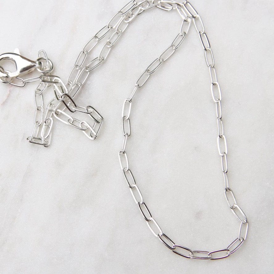 
                      
                        NKL 16" Sterling Silver Flat Drawn Cable Chain
                      
                    