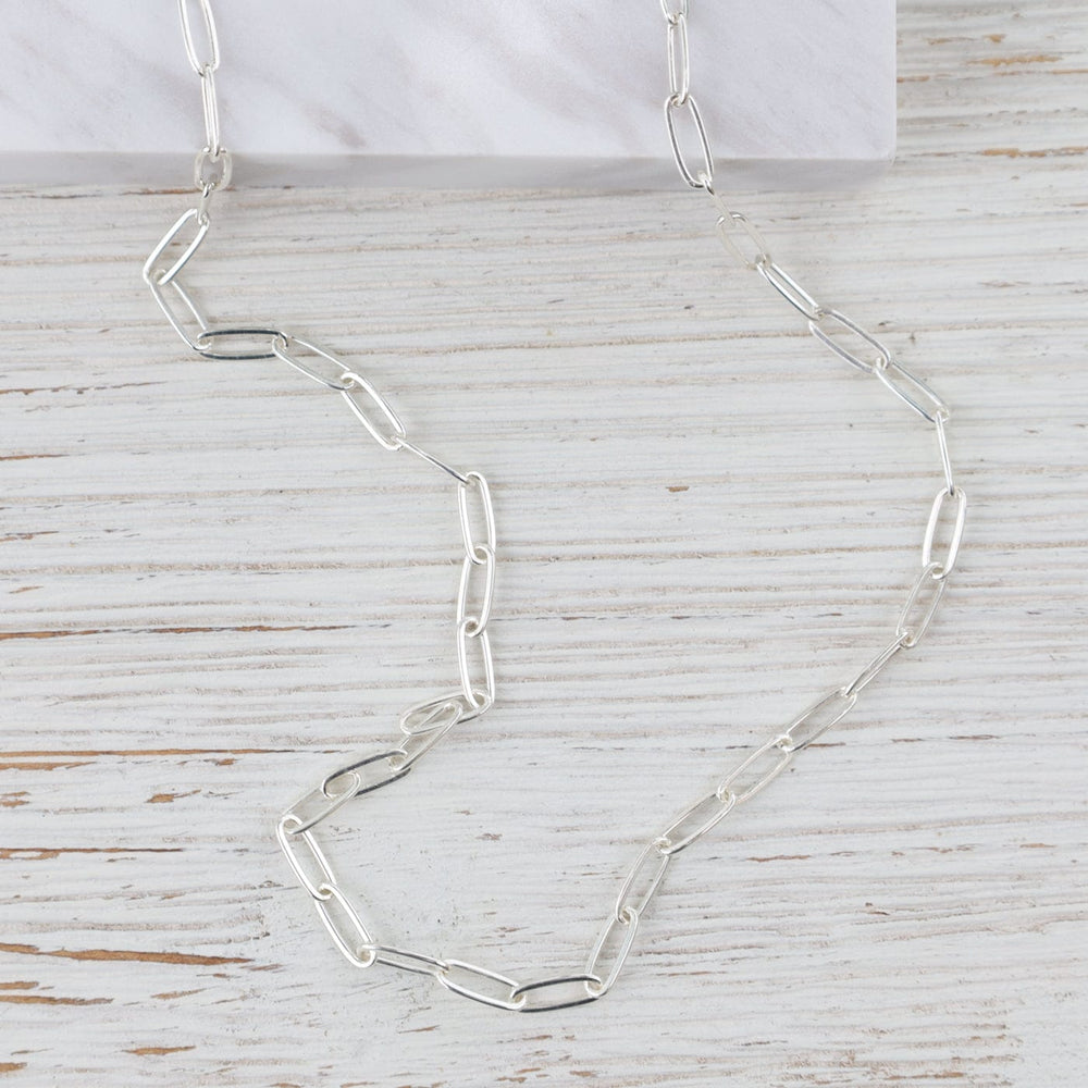 
                      
                        NKL 18" Sterling Silver Flat Drawn Cable Chain
                      
                    