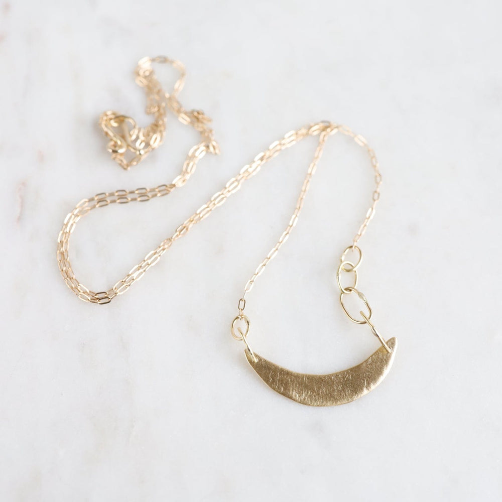 
                  
                    NKL-18K 18k Crescent Swing Necklace
                  
                