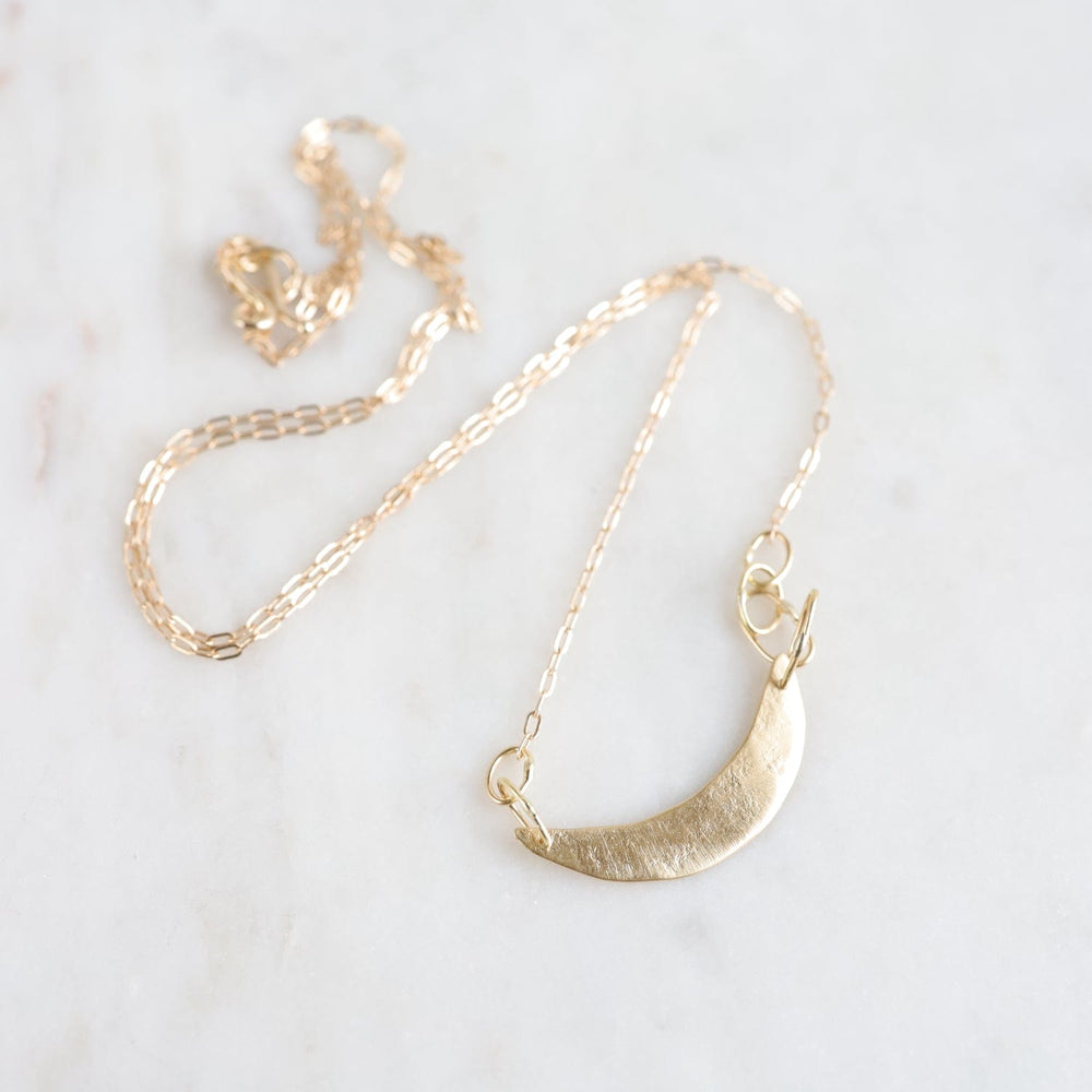 
                  
                    NKL-18K 18k Crescent Swing Necklace
                  
                