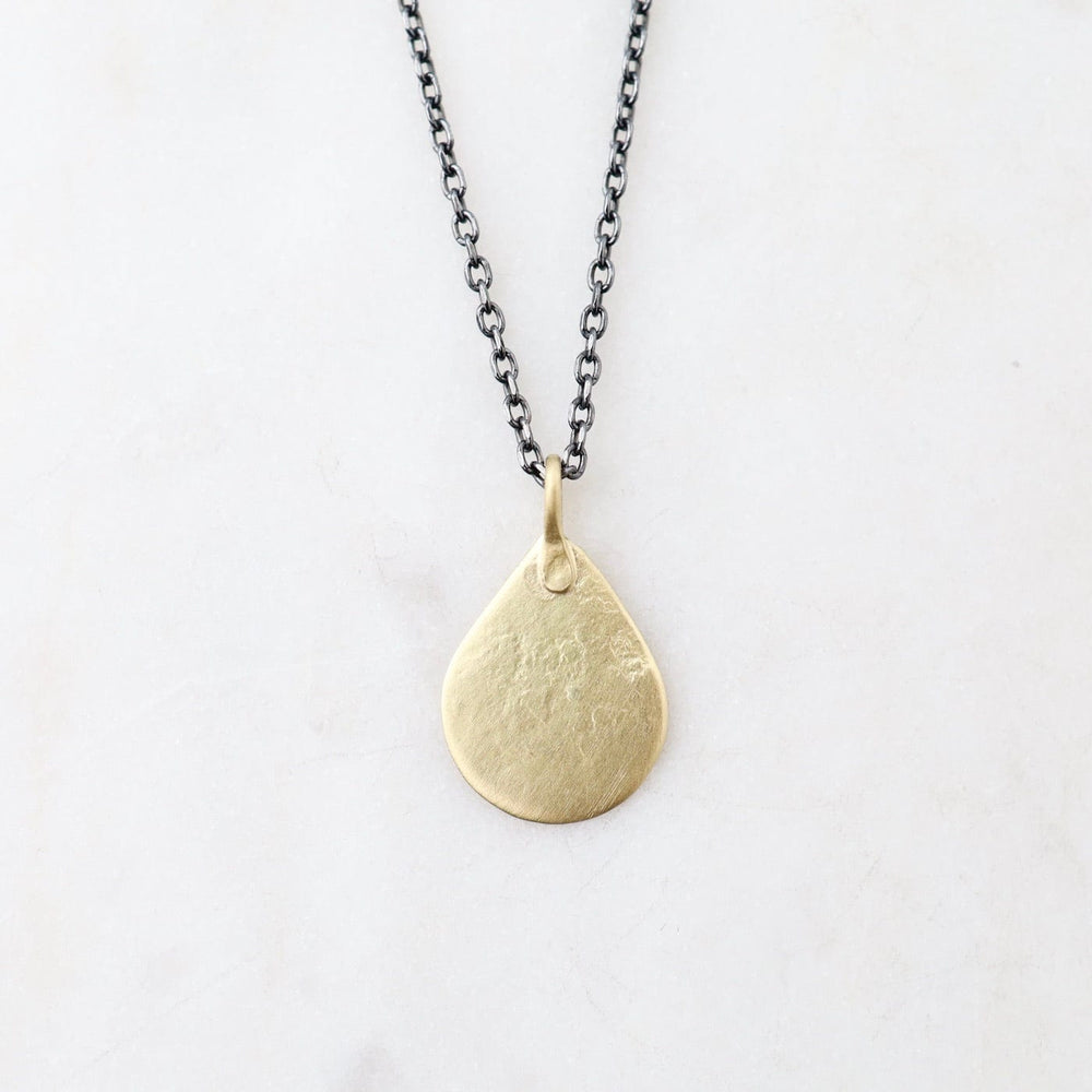 
                      
                        NKL-18K 18k Tiny Parchment Teardrop Necklace
                      
                    