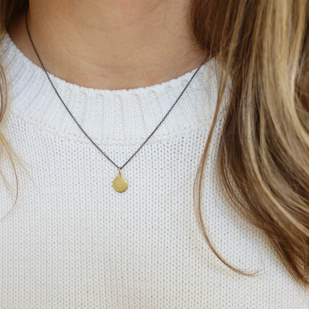 
                      
                        NKL-18K 18k Tiny Parchment Teardrop Necklace
                      
                    