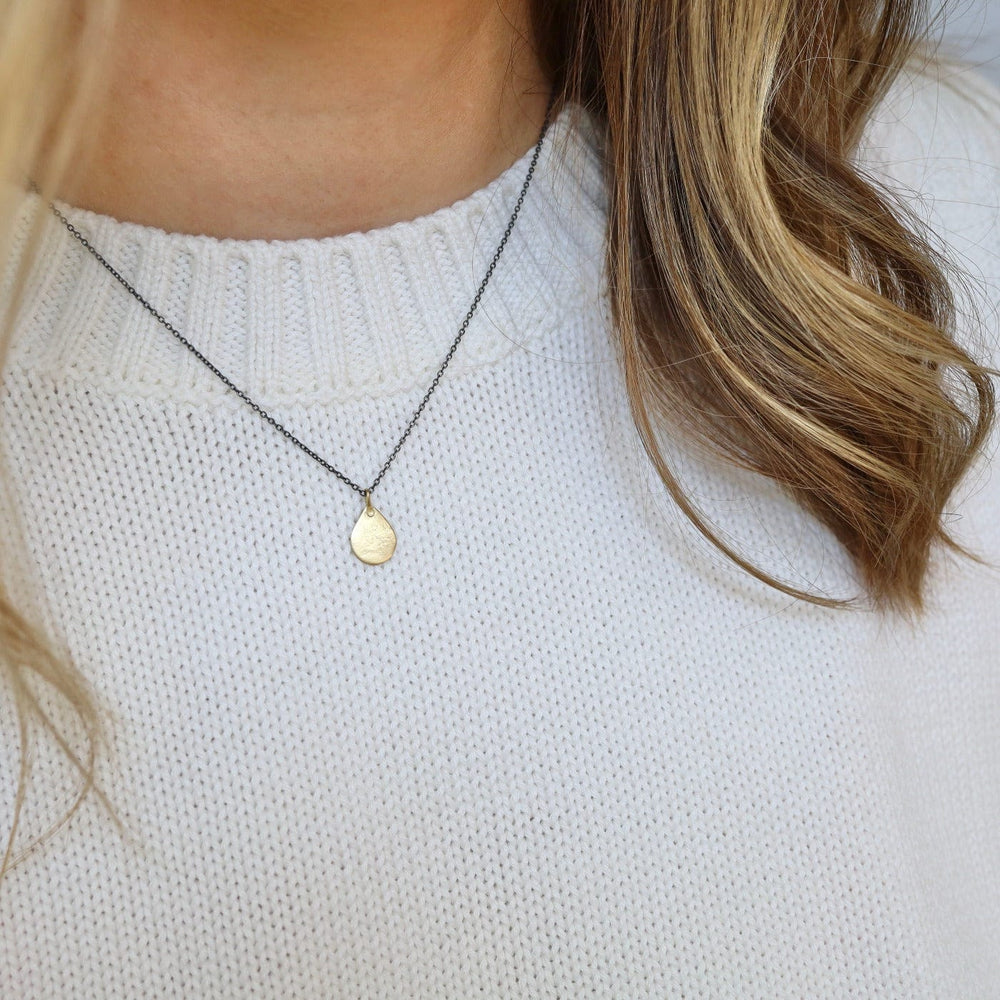 
                      
                        NKL-18K 18k Tiny Parchment Teardrop Necklace
                      
                    