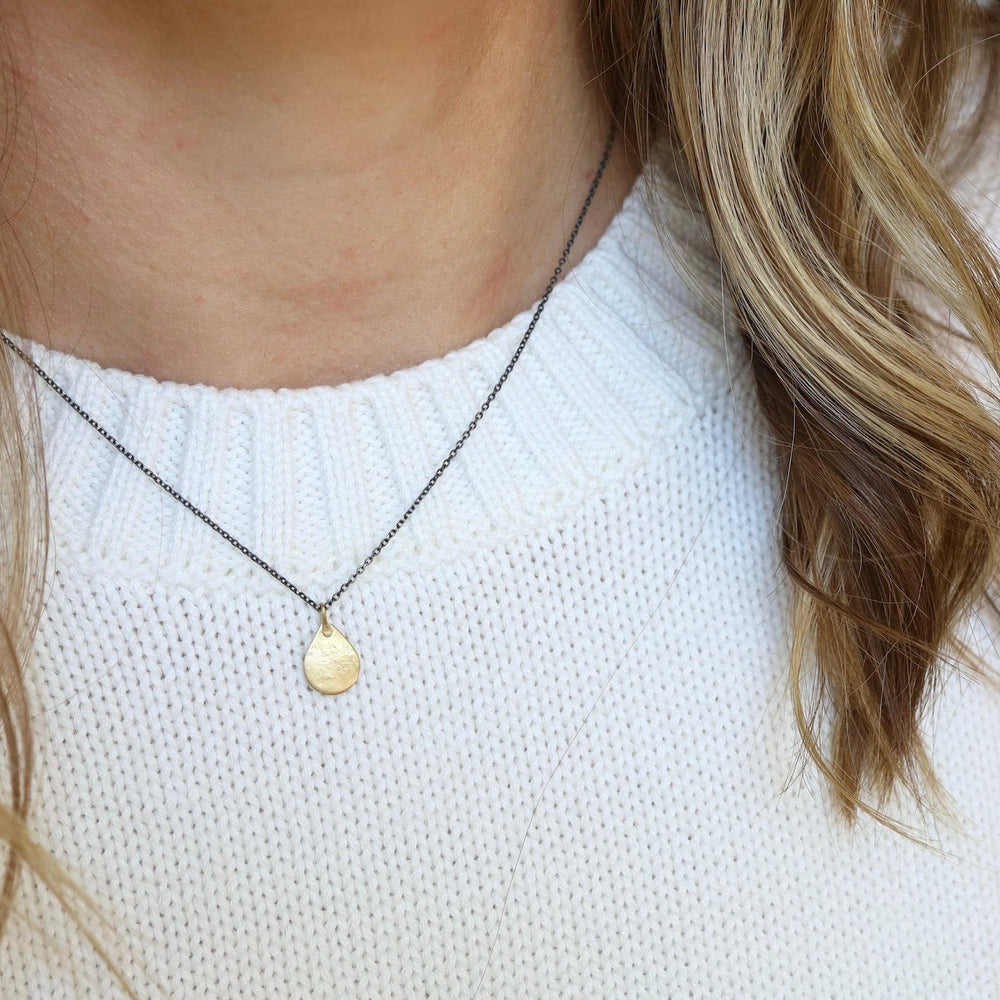 
                      
                        NKL-18K 18k Tiny Parchment Teardrop Necklace
                      
                    