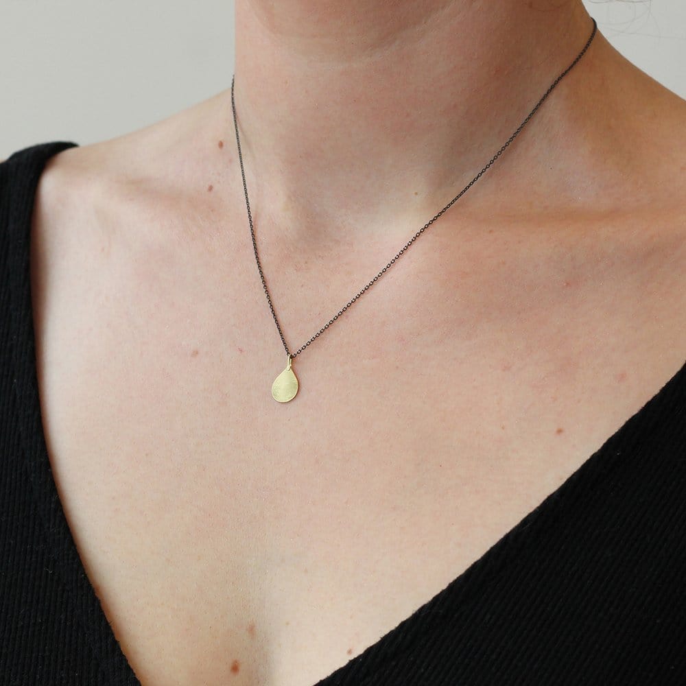 
                      
                        NKL-18K 18k Tiny Parchment Teardrop Necklace
                      
                    