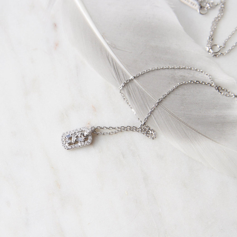 
                  
                    NKL-18K 18k White Gold Diamond Mini Dog Tag Necklace
                  
                