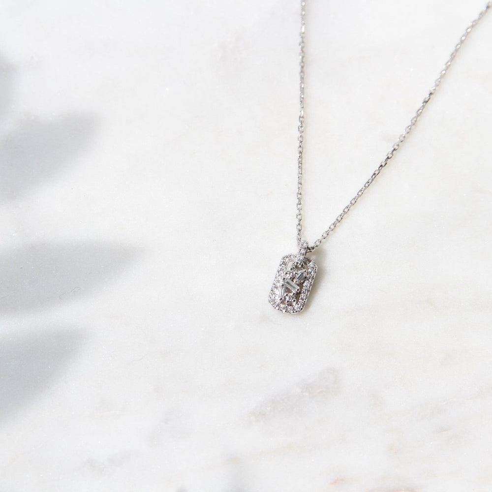
                  
                    NKL-18K 18k White Gold Diamond Mini Dog Tag Necklace
                  
                