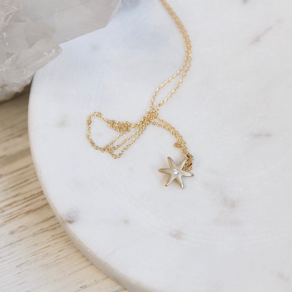 
                      
                        NKL-18K 18k Yellow Gold "Celestial" Diamond Star  Necklace
                      
                    