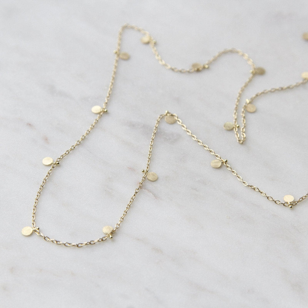 
                      
                        NKL-18K 18k Yellow Gold Evenly Scattered Dots Necklace
                      
                    