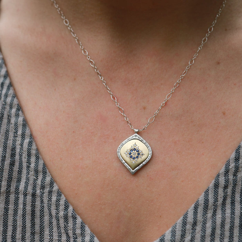 
                      
                        NKL-18K Allure Pendant with Sapphires Necklace
                      
                    