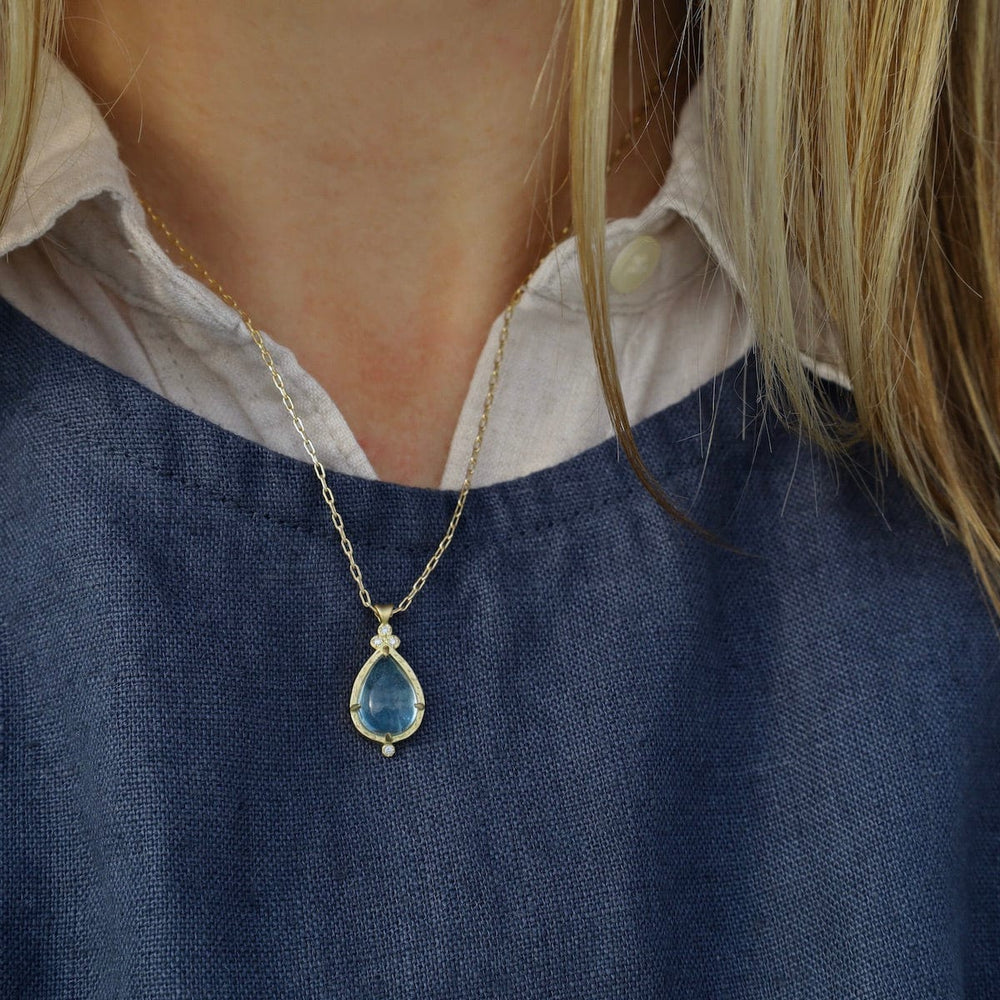 
                  
                    NKL-18K Aquamarine Pear Drop Pendant
                  
                