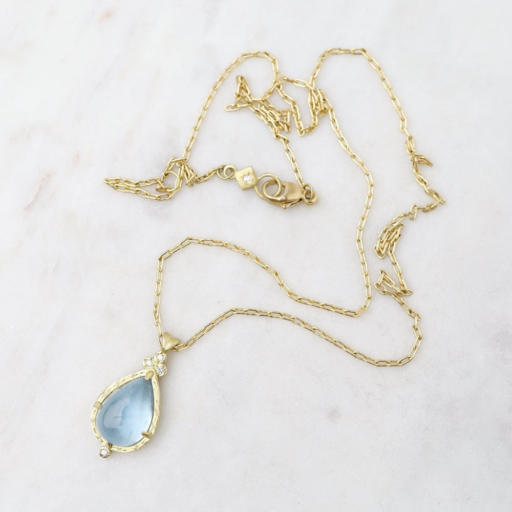 
                  
                    NKL-18K Aquamarine Pear Drop Pendant
                  
                