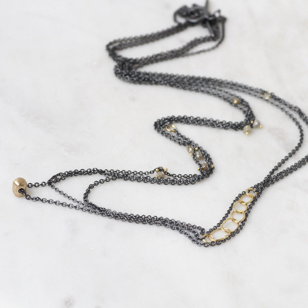 
                  
                    NKL-18K Cat's Cradle Necklace with Raw Diamonds
                  
                