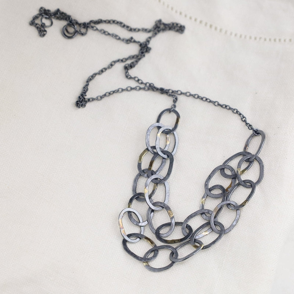 
                  
                    NKL-18K Double Linked Chain Necklace - Oxidized Silver with 18k Gold
                  
                