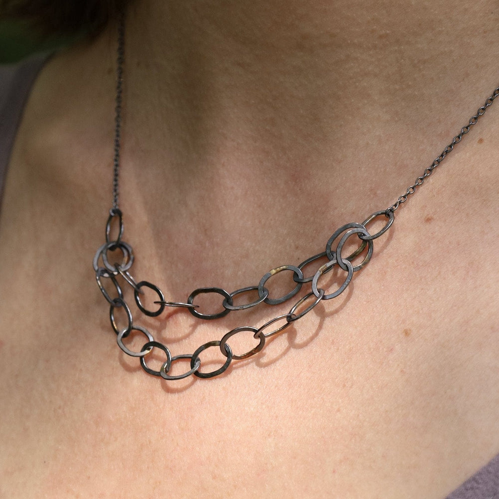 
                  
                    NKL-18K Double Linked Chain Necklace - Oxidized Silver with 18k Gold
                  
                