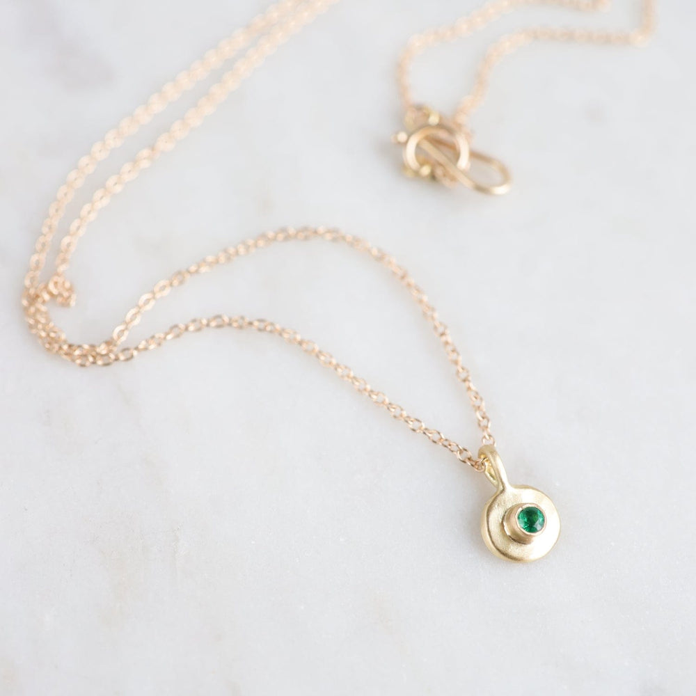 
                  
                    NKL-18K Emerald Dot Necklace
                  
                