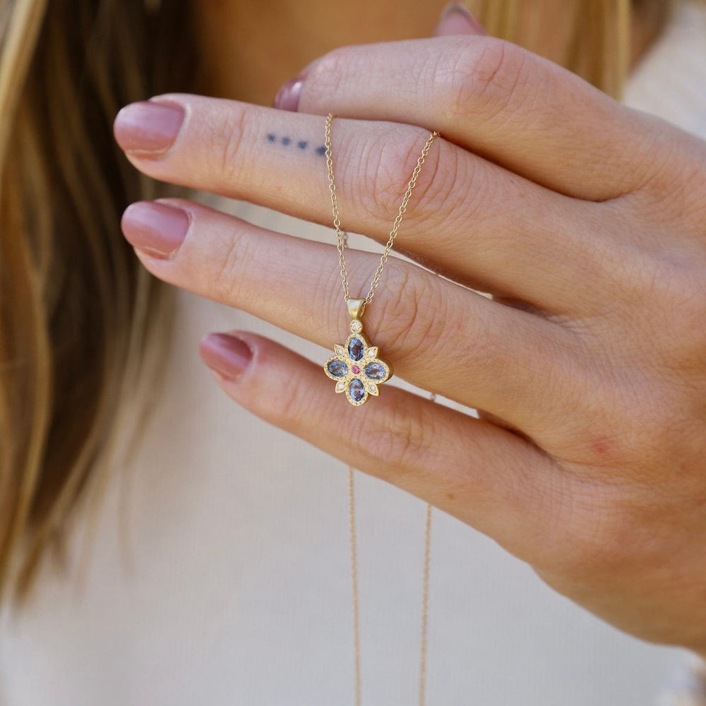 
                  
                    NKL-18K Floral Sapphire Pendant
                  
                