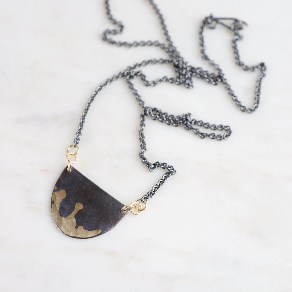 
                  
                    NKL-18K Gilded Half Moon Necklace
                  
                