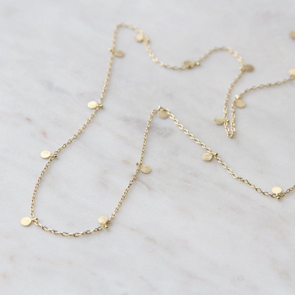 
                      
                        NKL-18K Gold Evenly Scattered Dots Necklace
                      
                    