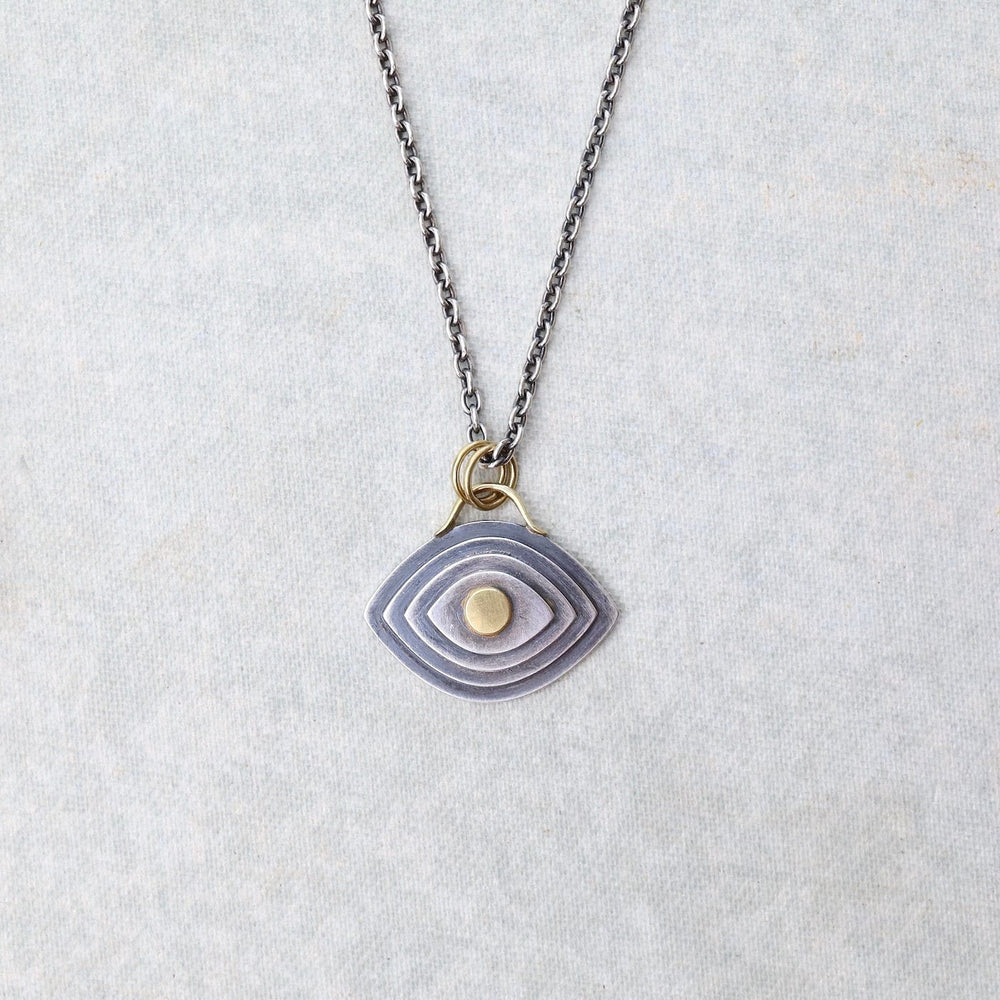 
                      
                        NKL-18K Golden Eye Necklace
                      
                    