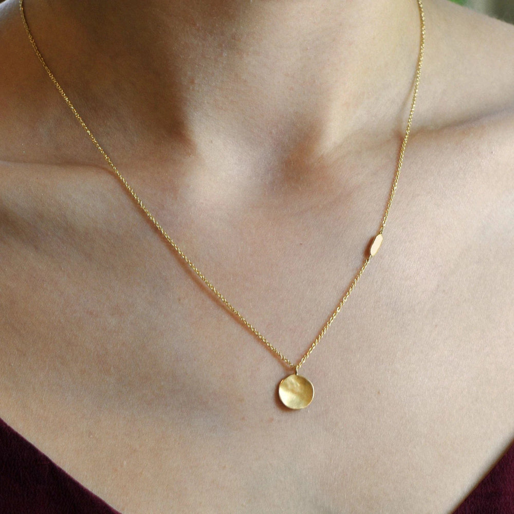 
                      
                        NKL-18K Hammered Disc Necklace
                      
                    