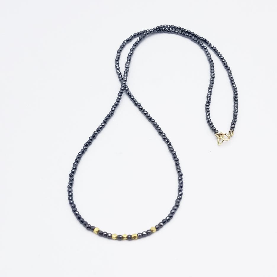 
                      
                        NKL-18K Hematite with 18K Hex Beads Necklace
                      
                    