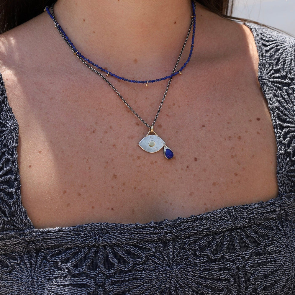 
                      
                        NKL-18K Lapis Teardrop Eye Necklace
                      
                    