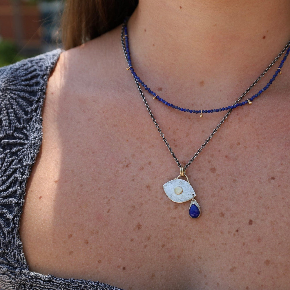 
                      
                        NKL-18K Lapis Teardrop Eye Necklace
                      
                    