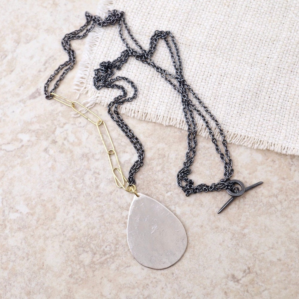 
                      
                        NKL-18K Large Silver Parchment Teardrop Necklace
                      
                    