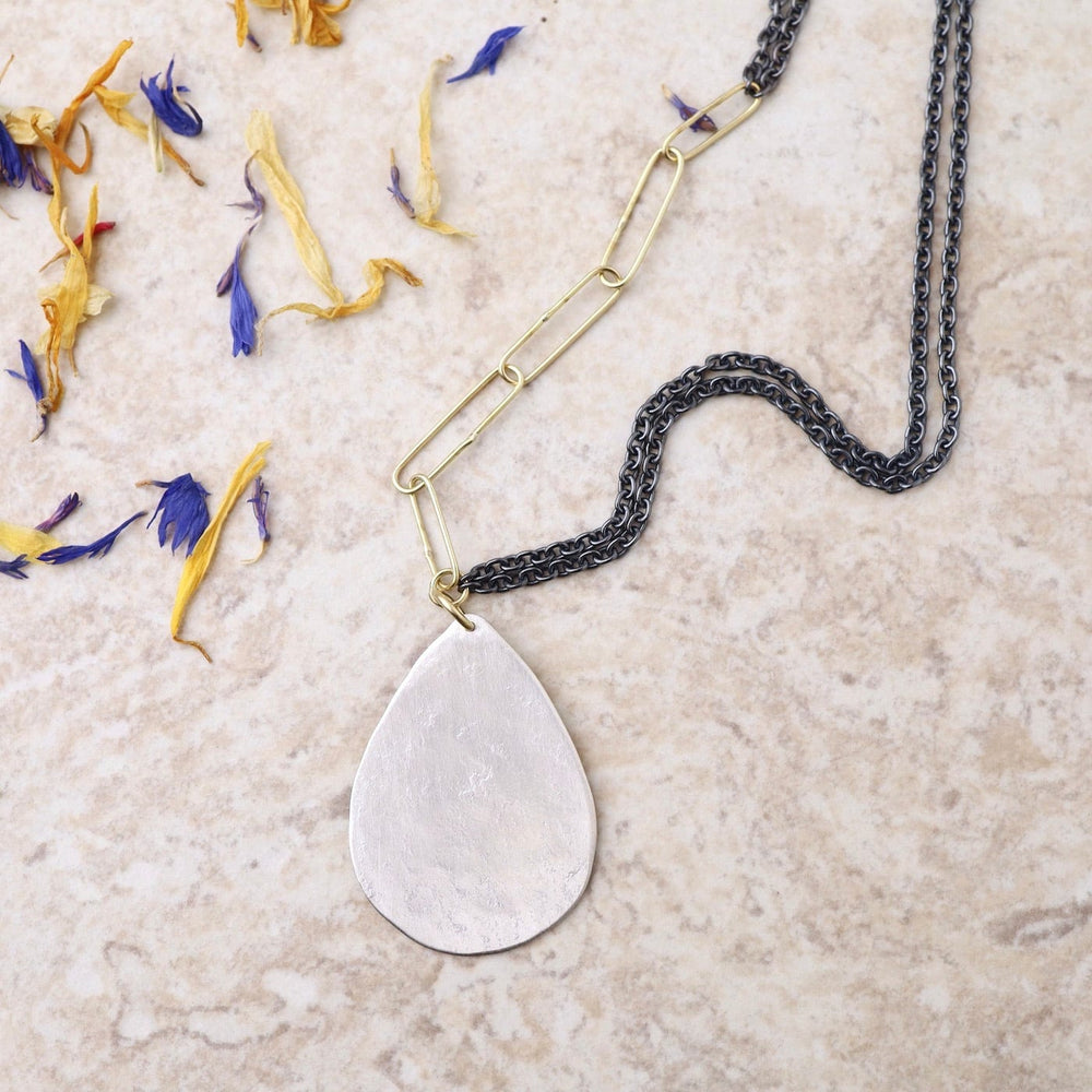 
                      
                        NKL-18K Large Silver Parchment Teardrop Necklace
                      
                    