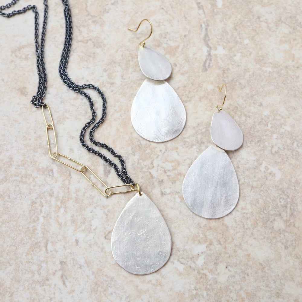 
                      
                        NKL-18K Large Silver Parchment Teardrop Necklace
                      
                    