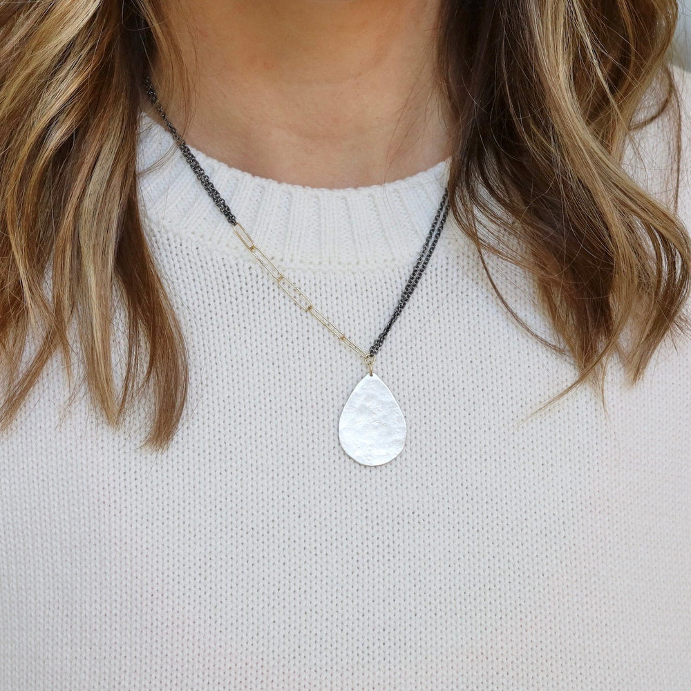 
                      
                        NKL-18K Large Silver Parchment Teardrop Necklace
                      
                    