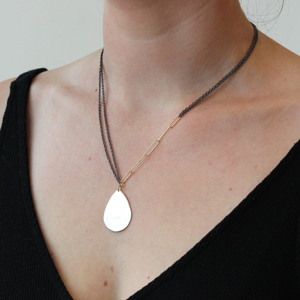 
                      
                        NKL-18K Large Silver Parchment Teardrop Necklace
                      
                    