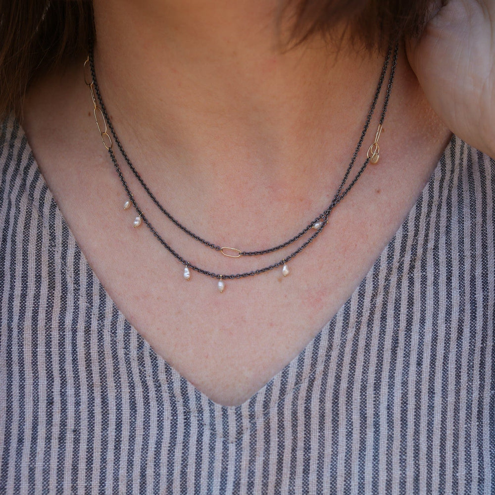 
                      
                        NKL-18K Long Kitchen Sink Necklace
                      
                    