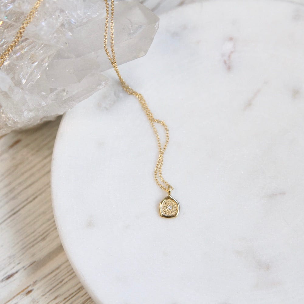 
                  
                    NKL-18K Mini Organic Stardust Necklace
                  
                