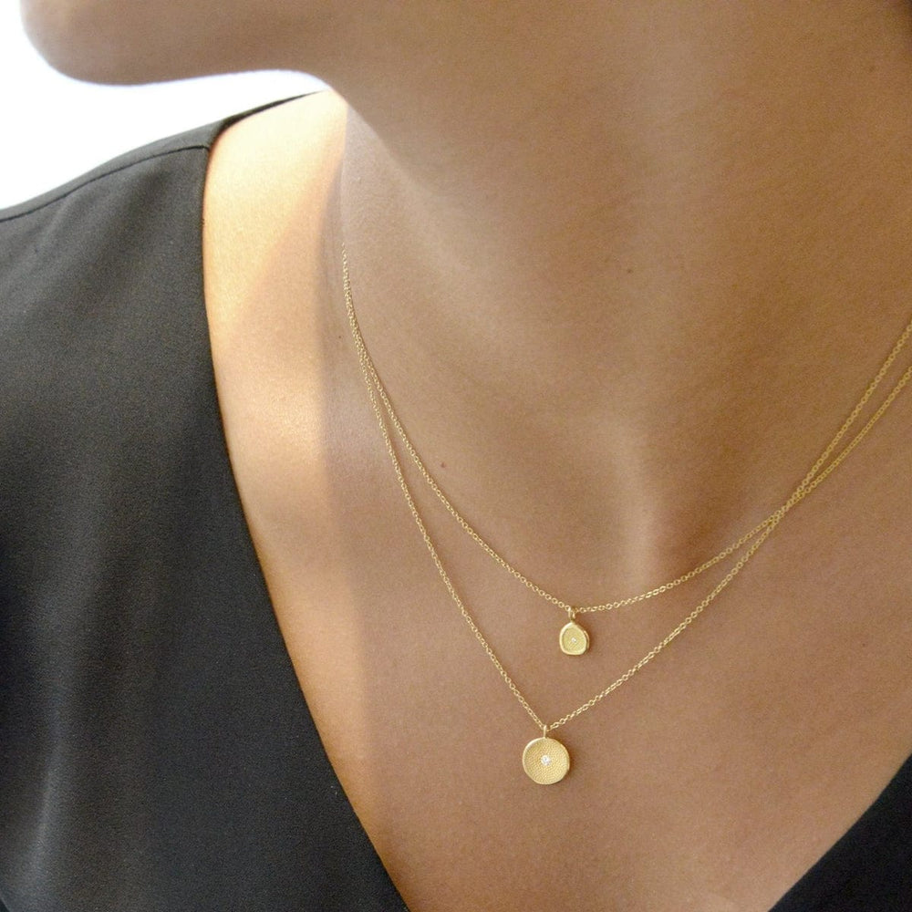 
                  
                    NKL-18K Mini Organic Stardust Necklace
                  
                