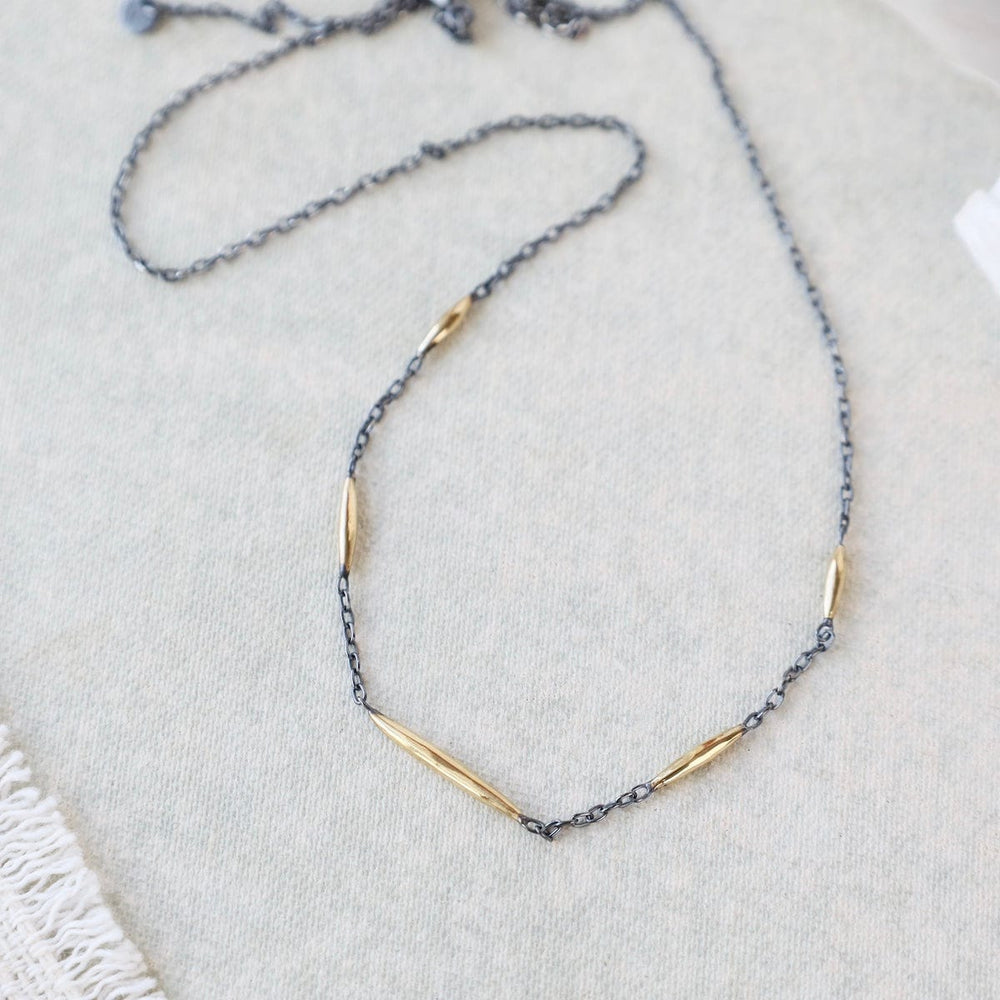 
                  
                    NKL-18K Murmur Necklace - oxidized silver and brushed 18k
                  
                