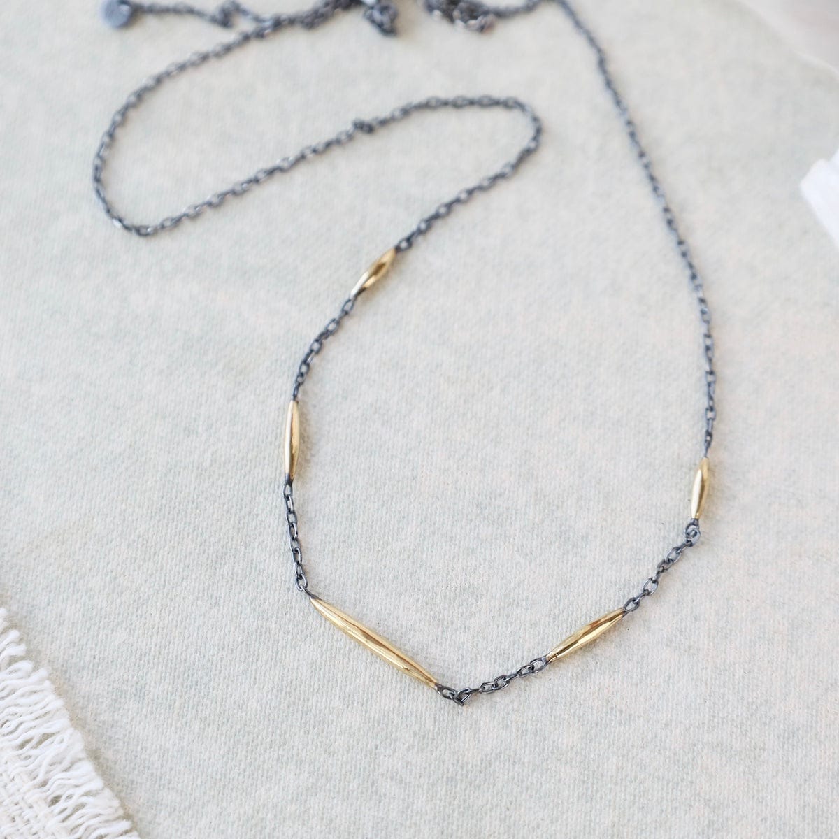 NKL-18K Murmur Necklace - oxidized silver and brushed 18k