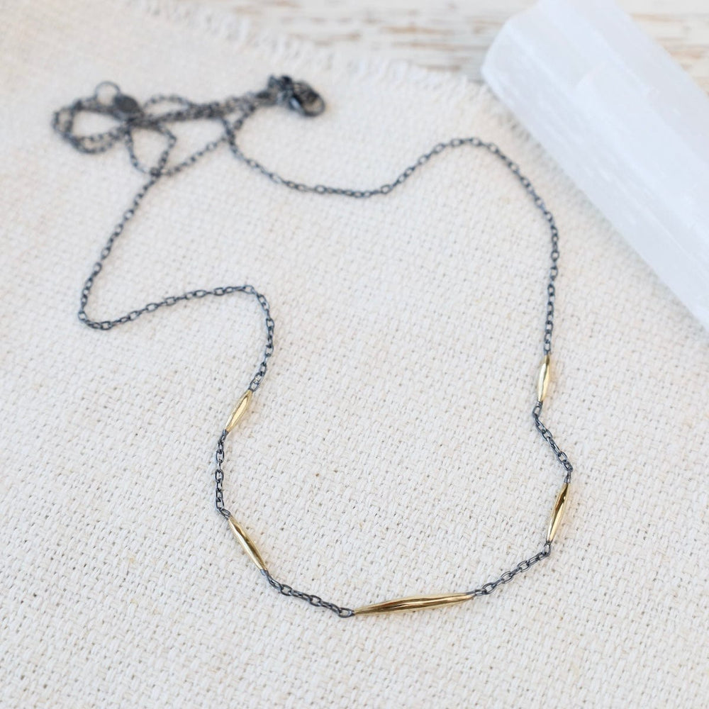 
                  
                    NKL-18K Murmur Necklace - oxidized silver and brushed 18k
                  
                