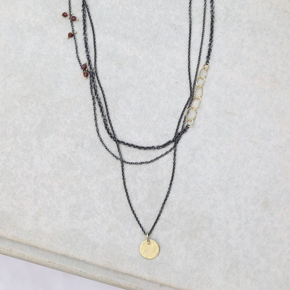 NKL-18K Parchment Disk Triple Chain Necklace with Garnets