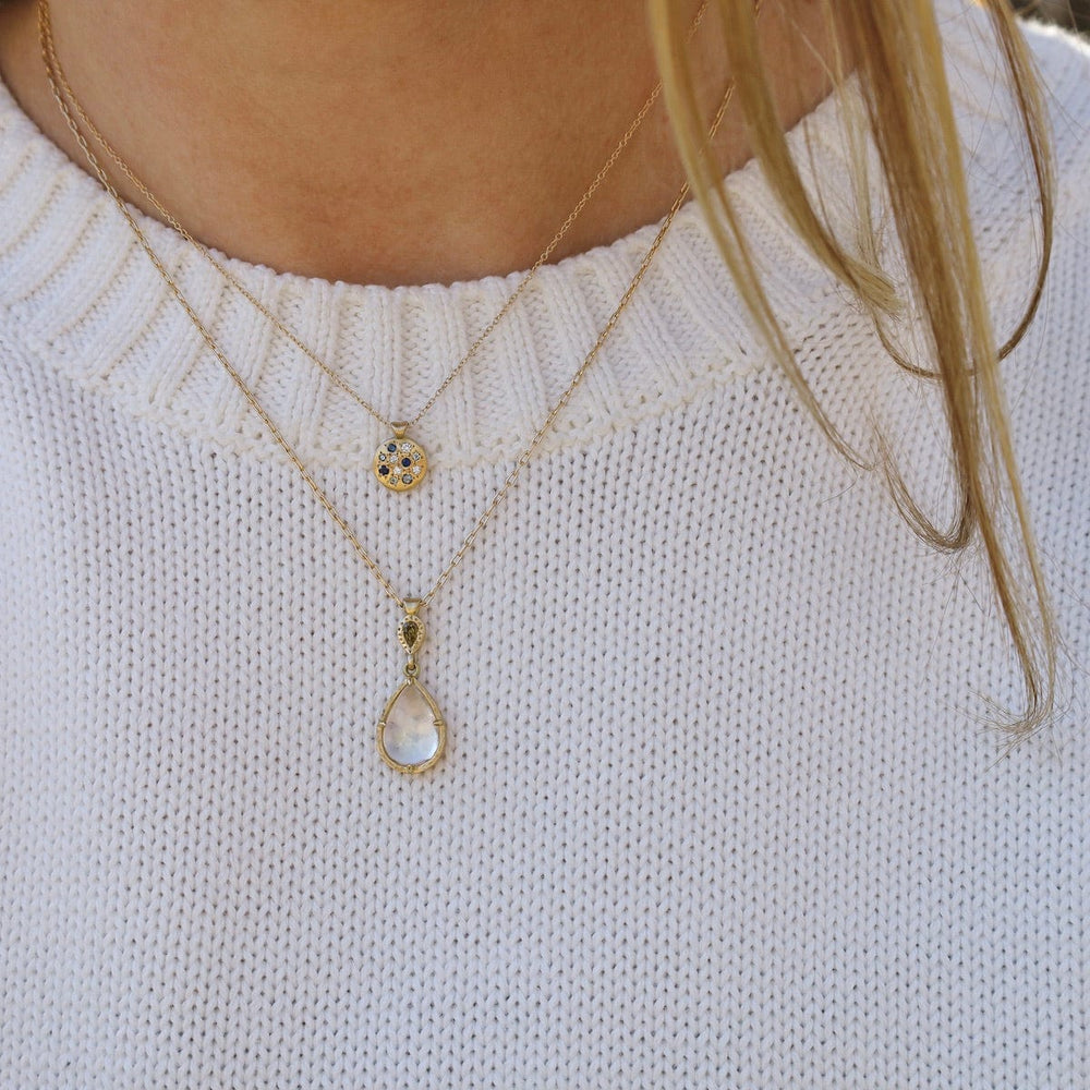 
                      
                        NKL-18K Prong Pear Moonstone Necklace
                      
                    